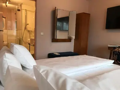 Ein Bett oder Betten in einem Zimmer der Unterkunft Lèvres Hotel