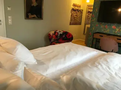 Ein Bett oder Betten in einem Zimmer der Unterkunft Lèvres Hotel