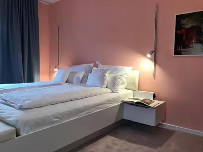 Ein Bett oder Betten in einem Zimmer der Unterkunft Lèvres Hotel