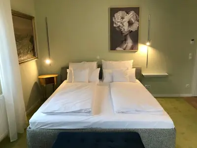Ein Bett oder Betten in einem Zimmer der Unterkunft Lèvres Hotel
