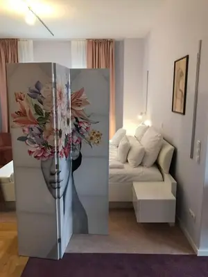 Ein Bett oder Betten in einem Zimmer der Unterkunft Lèvres Hotel