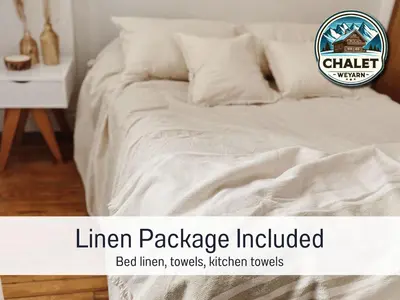 Ein Bett oder Betten in einem Zimmer der Unterkunft Chalet Weyarn - Doppelzimmer mit Gartenblick