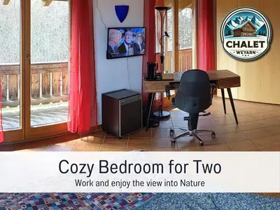 TV/Unterhaltungsangebot in der Unterkunft Chalet Weyarn - Doppelzimmer mit Gartenblick