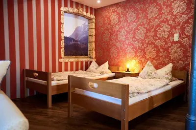 Ein Bett oder Betten in einem Zimmer der Unterkunft Beim Forchi