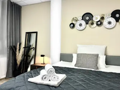 Ein Bett oder Betten in einem Zimmer der Unterkunft LeNi Living - Riesig! Repräsentativ! Ruhig!