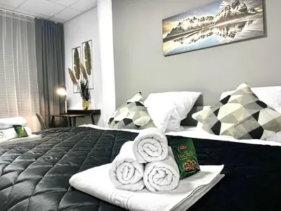 Ein Bett oder Betten in einem Zimmer der Unterkunft LeNi Living - Riesig! Repräsentativ! Ruhig!