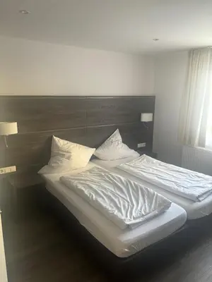 Ein Bett oder Betten in einem Zimmer der Unterkunft Marienhof