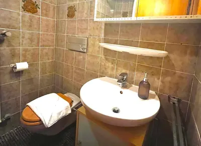 Ein Badezimmer in der Unterkunft Ferienwohnung Alpenglühen - mit Sauna & Frühstück