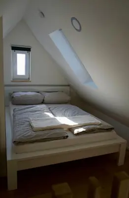 Ein Bett oder Betten in einem Zimmer der Unterkunft Haus Allgäu Wohnung Wertachauen