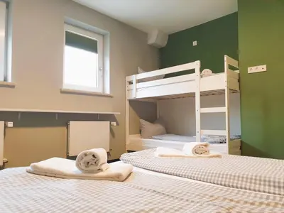Ein Bett oder Betten in einem Zimmer der Unterkunft ARRIVEL Apartments Moosfeld - bisher Novitel