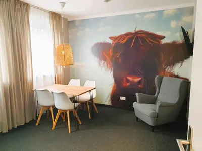Ein Sitzbereich in der Unterkunft ARRIVEL Apartments Moosfeld - bisher Novitel