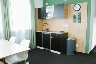 Küche/Küchenzeile in der Unterkunft ARRIVEL Apartments Moosfeld - bisher Novitel