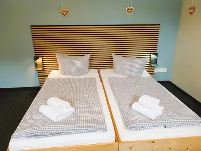 Ein Bett oder Betten in einem Zimmer der Unterkunft ARRIVEL Apartments Moosfeld - bisher Novitel