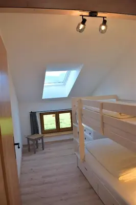 Ein Bett oder Betten in einem Zimmer der Unterkunft Ferienwohnung Thalhammer