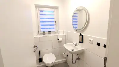 Ein Badezimmer in der Unterkunft Homely Stay - Urban Oasis Apartments