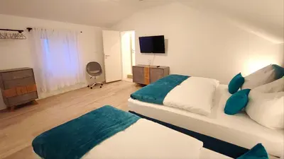 Ein Bett oder Betten in einem Zimmer der Unterkunft Homely Stay - Urban Oasis Apartments