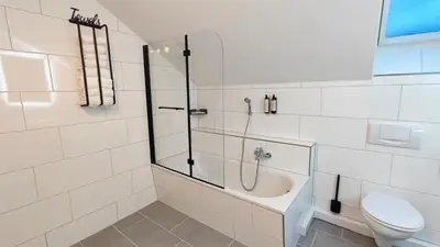 Ein Badezimmer in der Unterkunft Homely Stay - Urban Oasis Apartments