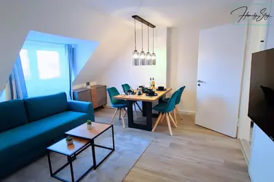 Ein Sitzbereich in der Unterkunft Homely Stay - Urban Oasis Apartments