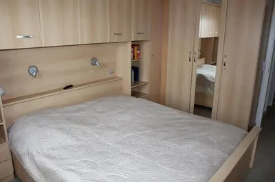 Ein Bett oder Betten in einem Zimmer der Unterkunft Ferienhaus Nr 75, Kategorie Komfort, Feriendorf Hochbergle, Allgäu