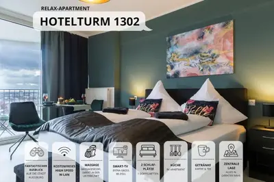 Ein Bett oder Betten in einem Zimmer der Unterkunft Relax Apartment 1302 Tolle Aussicht Massagesessel Smart TV