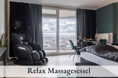 Ein Sitzbereich in der Unterkunft Relax Apartment 1302 Tolle Aussicht Massagesessel Smart TV