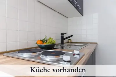 Küche/Küchenzeile in der Unterkunft Relax Apartment 1302 Tolle Aussicht Massagesessel Smart TV