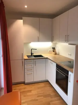 Küche/Küchenzeile in der Unterkunft Baumann Suiten