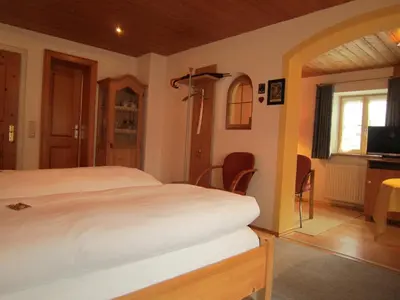Ein Bett oder Betten in einem Zimmer der Unterkunft Gästehaus Unruh