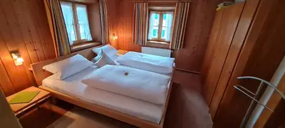 Ein Bett oder Betten in einem Zimmer der Unterkunft Gästehaus Unruh