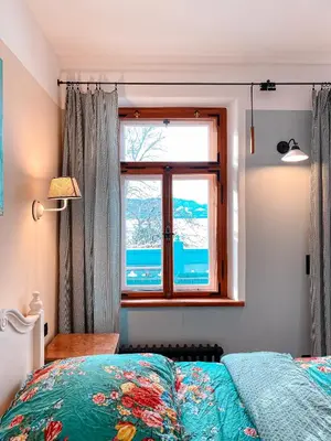 Ein Bett oder Betten in einem Zimmer der Unterkunft Premium Panorama-Ferienwohnung direkt am Kochelsee