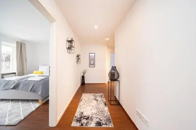 Ein Bett oder Betten in einem Zimmer der Unterkunft LaDolceVita - 100m2 Apartment in Zentraler Lage