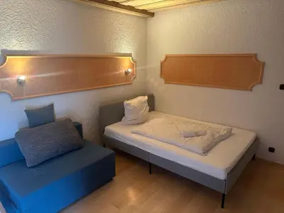 Ein Bett oder Betten in einem Zimmer der Unterkunft Apartment with top kitchen and 3 sleeping rooms