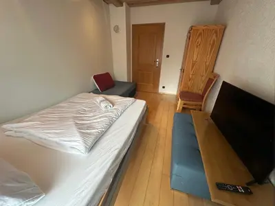 Ein Bett oder Betten in einem Zimmer der Unterkunft Apartment with top kitchen and 3 sleeping rooms