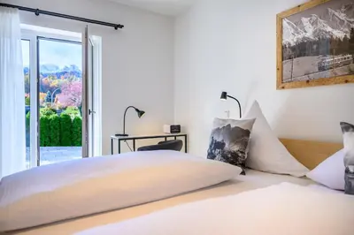 Ein Bett oder Betten in einem Zimmer der Unterkunft Chalet Alpenflair I