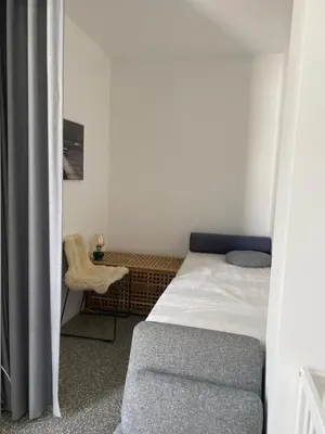 Ein Bett oder Betten in einem Zimmer der Unterkunft Studio Heinrich 1
