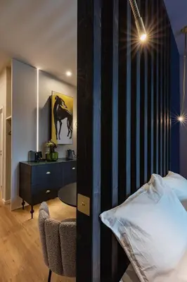 Ein Bett oder Betten in einem Zimmer der Unterkunft kalm stay - a design Aparthotel