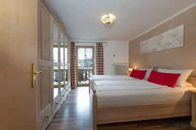 Ein Bett oder Betten in einem Zimmer der Unterkunft Haus Sabine, Wallgau