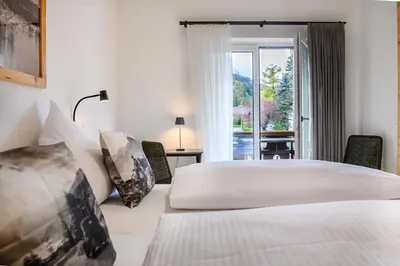 Ein Bett oder Betten in einem Zimmer der Unterkunft Chalet Alpenflair II