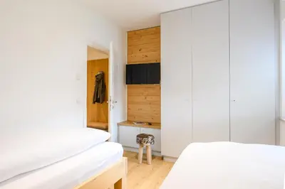 Ein Bett oder Betten in einem Zimmer der Unterkunft Chalet Alpenflair II