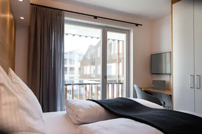 Ein Bett oder Betten in einem Zimmer der Unterkunft Bergliebe