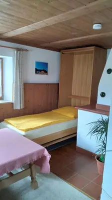 Ein Bett oder Betten in einem Zimmer der Unterkunft Ferienhaus Axmann
