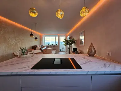 Ein Bett oder Betten in einem Zimmer der Unterkunft Stylische Sunset-Wohnung