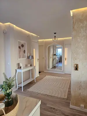 Ein Bett oder Betten in einem Zimmer der Unterkunft Stylische Sunset-Wohnung
