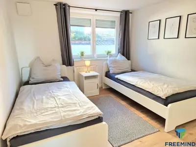 Ein Bett oder Betten in einem Zimmer der Unterkunft frisch modernisiertes Apartment