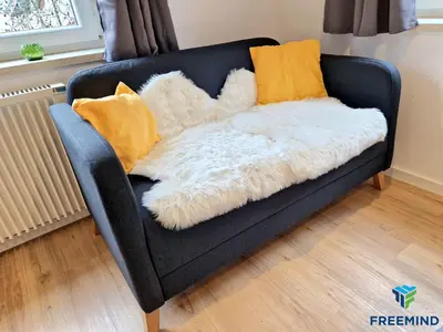 Ein Sitzbereich in der Unterkunft frisch modernisiertes Apartment