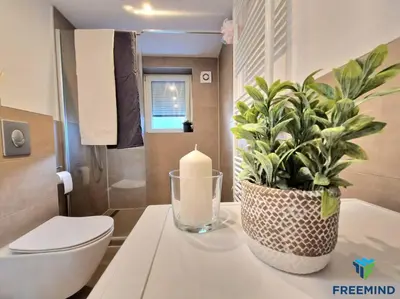 Ein Badezimmer in der Unterkunft frisch modernisiertes Apartment