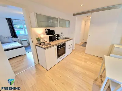 Küche/Küchenzeile in der Unterkunft frisch modernisiertes Apartment