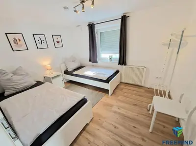 Ein Bett oder Betten in einem Zimmer der Unterkunft frisch modernisiertes Apartment
