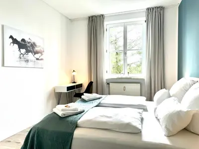 Ein Bett oder Betten in einem Zimmer der Unterkunft UNiQE - city central - design apartment - SKY-TV - free parking