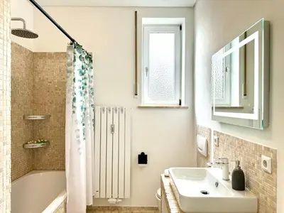 Ein Badezimmer in der Unterkunft UNiQE - city central - design apartment - SKY-TV - free parking